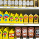 Grocery store shelf of condiments